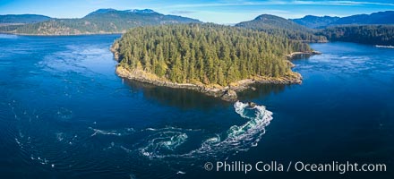 Seymour Narrows with strong tidal currents.  Between Vancouver Island and Quadra Island, Seymour Narrows is about 750 meters wide and has currents reaching 15 knots.  Aerial photo.