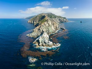 Aerial Photo of the West End of Catalina Island, California. Lush kelp forests line the rocky coastline here.  Eagle Rock appears at the right