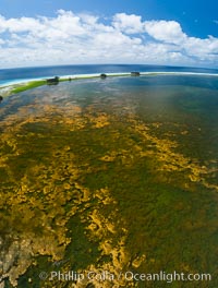 Aerial view of the lagoon inside Clipperton Island.  The lagoon within the atoll was formerly open to the ocean but has been closed and stagnant for many decades. Some experts believe erosion will open the lagoon up to the ocean again soon. Clipperton Island, a minor territory of France also known as Ile de la Passion, is a spectacular coral atoll in the eastern Pacific. By permit HC / 1485 / CAB (France)