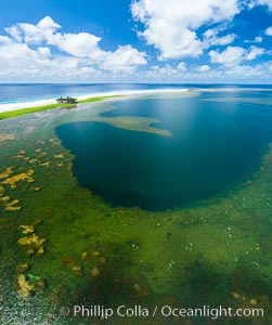 Aerial view of the lagoon inside Clipperton Island.  The lagoon within the atoll was formerly open to the ocean but has been closed and stagnant for many decades. Some experts believe erosion will open the lagoon up to the ocean again soon. Clipperton Island, a minor territory of France also known as Ile de la Passion, is a spectacular coral atoll in the eastern Pacific. By permit HC / 1485 / CAB (France)