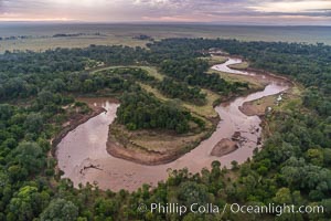 Aerial view of the Mara River, Maasai Mara, Kenya.  Photo taken while hot air ballooning at sunrise, Maasai Mara National Reserve