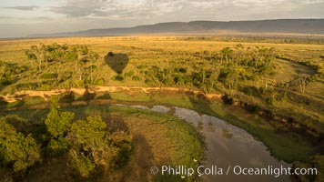 Aerial view of the Mara River, Maasai Mara, Kenya.  Photo taken while hot air ballooning at sunrise, Maasai Mara National Reserve