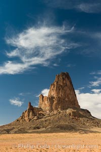 Agaltha Peak, also know as El Capitan Peak, rises to over 1500' in height near Kayenta, Arizona and Monument Valley.  Agathla Peak is an eroded volcanic plug consisting of volcanic breccia cut by dikes of an unusual igneous rock called minette