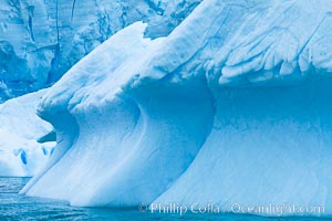 Antarctic icebergs, sculpted by ocean tides into fantastic shapes, Cierva Cove