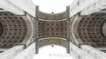 Arc de Triomphe. The Arc de Triomphe (Arc de Triomphe de l'Etoile) is one of the most famous monuments in Paris. It stands in the centre of the Place Charles de Gaulle (originally named Place de l'Etoile), at the western end of the Champs-Elysees. The Arc de Triomphe (in English: "Triumphal Arch") honors those who fought and died for France in the French Revolutionary and the Napoleonic Wars, with the names of all French victories and generals inscribed on its inner and outer surfaces. Beneath its vault lies the Tomb of the Unknown Soldier from World War I. The monument was designed by Jean Chalgrin in 1806, and its iconographic program pitted heroically nude French youths against bearded Germanic warriors in chain mail. It set the tone for public monuments, with triumphant patriotic messages. The monument stands 50 metres (164 ft) in height, 45 m (148 ft) wide and 22 m (72 ft) deep