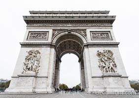 Arc de Triomphe. The Arc de Triomphe (Arc de Triomphe de l'Etoile) is one of the most famous monuments in Paris. It stands in the centre of the Place Charles de Gaulle (originally named Place de l'Etoile), at the western end of the Champs-Elysees. The Arc de Triomphe (in English: "Triumphal Arch") honors those who fought and died for France in the French Revolutionary and the Napoleonic Wars, with the names of all French victories and generals inscribed on its inner and outer surfaces. Beneath its vault lies the Tomb of the Unknown Soldier from World War I. The monument was designed by Jean Chalgrin in 1806, and its iconographic program pitted heroically nude French youths against bearded Germanic warriors in chain mail. It set the tone for public monuments, with triumphant patriotic messages. The monument stands 50 metres (164 ft) in height, 45 m (148 ft) wide and 22 m (72 ft) deep