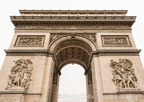 Arc de Triomphe. The Arc de Triomphe (Arc de Triomphe de l'Etoile) is one of the most famous monuments in Paris. It stands in the centre of the Place Charles de Gaulle (originally named Place de l'Etoile), at the western end of the Champs-Elysees. The Arc de Triomphe (in English: "Triumphal Arch") honors those who fought and died for France in the French Revolutionary and the Napoleonic Wars, with the names of all French victories and generals inscribed on its inner and outer surfaces. Beneath its vault lies the Tomb of the Unknown Soldier from World War I. The monument was designed by Jean Chalgrin in 1806, and its iconographic program pitted heroically nude French youths against bearded Germanic warriors in chain mail. It set the tone for public monuments, with triumphant patriotic messages. The monument stands 50 metres (164 ft) in height, 45 m (148 ft) wide and 22 m (72 ft) deep