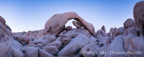 Panoramic image of Arch Rock at dusk