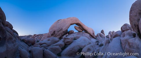 Panoramic image of Arch Rock at dusk, Joshua Tree National Park, California