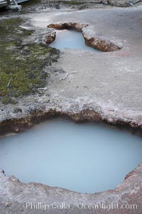 The Artist Paint Pots area of Yellowstone National Park holds steaming pools, mud pots (roiling mud mixed with sulfuric acid and steam) and paint pots (mud pots colored with dissolved minerals)