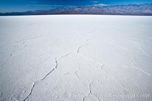 Badwater, California.  Badwater, at 282 feet below sea level, is the lowest point in North America.  9000 square miles of watershed drain into the Badwater basin, to dry and form huge white salt flats, Death Valley National Park