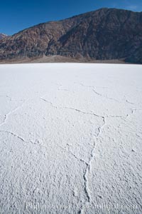 Badwater, California.  Badwater, at 282 feet below sea level, is the lowest point in North America.  9000 square miles of watershed drain into the Badwater basin, to dry and form huge white salt flats, Death Valley National Park