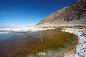 Badwater, California.  Badwater, at 282 feet below sea level, is the lowest point in North America.  9000 square miles of watershed drain into the Badwater basin, to dry and form huge white salt flats, Death Valley National Park