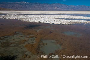 Badwater, California.  Badwater, at 282 feet below sea level, is the lowest point in North America.  9000 square miles of watershed drain into the Badwater basin, to dry and form huge white salt flats, Death Valley National Park