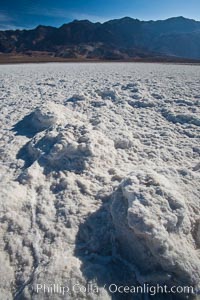 Devils Golf Course, California.  Evaporated salt has formed into gnarled, complex crystalline shapes in on the salt pan of Death Valley National Park, one of the largest salt pans in the world.  The shapes are constantly evolving as occasional floods submerge the salt concretions before receding and depositing more salt