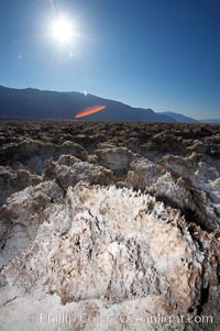 Devils Golf Course, California.  Evaporated salt has formed into gnarled, complex crystalline shapes in on the salt pan of Death Valley National Park, one of the largest salt pans in the world.  The shapes are constantly evolving as occasional floods submerge the salt concretions before receding and depositing more salt