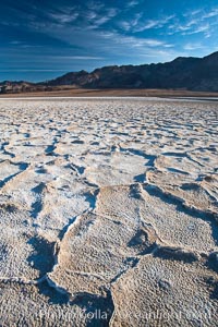 Devils Golf Course, California.  Evaporated salt has formed into gnarled, complex crystalline shapes in on the salt pan of Death Valley National Park, one of the largest salt pans in the world.  The shapes are constantly evolving as occasional floods submerge the salt concretions before receding and depositing more salt