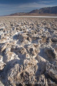 Devils Golf Course, California.  Evaporated salt has formed into gnarled, complex crystalline shapes in on the salt pan of Death Valley National Park, one of the largest salt pans in the world.  The shapes are constantly evolving as occasional floods submerge the salt concretions before receding and depositing more salt