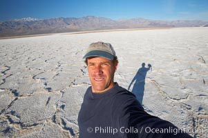 Self portrait on salt pan, Death Valley National Park, California