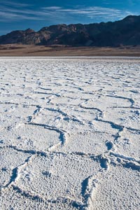 Devils Golf Course, California.  Evaporated salt has formed into gnarled, complex crystalline shapes in on the salt pan of Death Valley National Park, one of the largest salt pans in the world.  The shapes are constantly evolving as occasional floods submerge the salt concretions before receding and depositing more salt