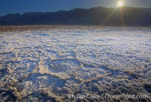 Devils Golf Course. Evaporated salt has formed into gnarled, complex crystalline shapes on the salt pan of Death Valley National Park, one of the largest salt pans in the world.  The shapes are constantly evolving as occasional floods submerge the salt concretions before receding and depositing more salt