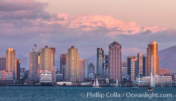 San Diego city skyline, dusk, clearing storm clouds