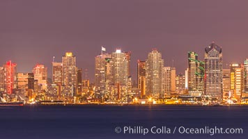 San Diego city skyline, dusk, clearing storm clouds