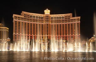 The Bellagio Hotel fountains, at night.  The Bellagio Hotel fountains are one of the most popular attractions in Las Vegas, showing every half hour or so throughout the day, choreographed to famous Hollywood music