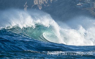 Big Surf Breaking at Boomer Beach, La Jolla, Scripps Institute of Oceanography in the distance