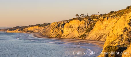Blacks Beach and Torrey Pines State Beach at sunset, with Torrey Pines glider port, looking north.