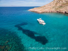 Boat Ambar and School of Fish, Ensenada el Embudo, Isla Partida, aerial photo