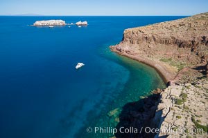 Boat Ambar III at Punta Maru, Isla Partida, Sea of Cortez. Los Islotes in the distance