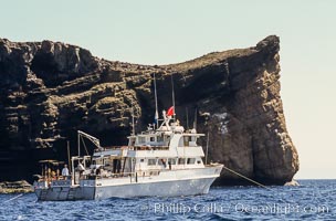 Boat Horizon at anchor in front of Battleship Point, Guadalupe Island (Isla Guadalupe)