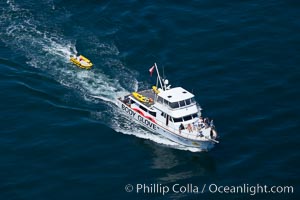 Body Glove boat motoring over the ocean, Redondo Beach, California