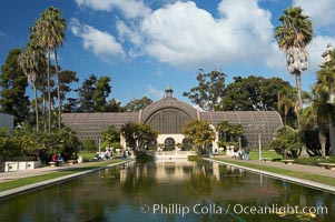 The Botanical Building in Balboa Park, San Diego.  The Botanical Building, at 250 feet long by 75 feet wide and 60 feet tall, was the largest wood lath structure in the world when it was built in 1915 for the Panama-California Exposition. The Botanical Building, located on the Prado, west of the Museum of Art, contains about 2,100 permanent tropical plants along with changing seasonal flowers. The Lily Pond, just south of the Botanical Building, is an eloquent example of the use of reflecting pools to enhance architecture. The 193 by 43 foot pond and smaller companion pool were originally referred to as Las Lagunas de las Flores (The Lakes of the Flowers) and were designed as aquatic gardens. The pools contain exotic water lilies and lotus which bloom spring through fall.  Balboa Park, San Diego