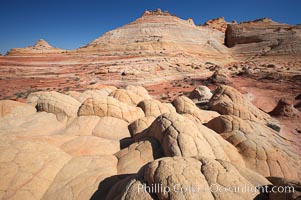 Brain rocks.  Sandstone is curiously eroded through the forces water and wind acting over eons.  Cracks and joints arise when water freezes and expands repeatedly, braking apart the soft sandstone, North Coyote Buttes, Paria Canyon-Vermilion Cliffs Wilderness, Arizona