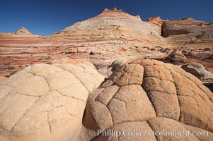 Brain rocks.  Sandstone is curiously eroded through the forces water and wind acting over eons.  Cracks and joints arise when water freezes and expands repeatedly, braking apart the soft sandstone, North Coyote Buttes, Paria Canyon-Vermilion Cliffs Wilderness, Arizona