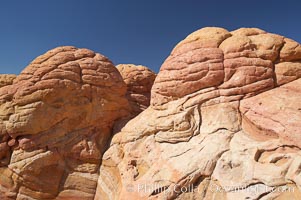 Brain rocks.  Sandstone is curiously eroded through the forces water and wind acting over eons.  Cracks and joints arise when water freezes and expands repeatedly, braking apart the soft sandstone, North Coyote Buttes, Paria Canyon-Vermilion Cliffs Wilderness, Arizona