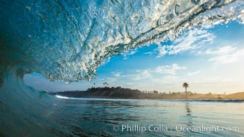 Breaking wave, Moonlight Beach, Encinitas, morning, barrel shaped surf, California.