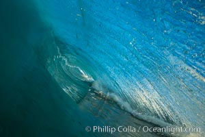 Breaking wave, morning, barrel shaped surf, California