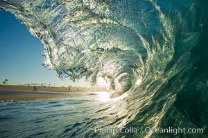 Breaking wave, morning, barrel shaped surf, California