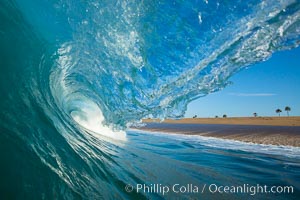 Breaking wave, morning, barrel shaped surf, California