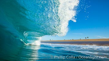 Breaking wave, morning, barrel shaped surf, California
