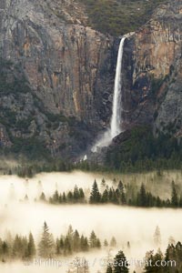 Bridalveil Falls and misty Yosemite Valley, Yosemite National Park, California