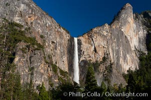 Bridalveil Falls in Yosemite drops 620 feet (188 m) from a hanging valley to the floor of Yosemite Valley, Yosemite National Park, California