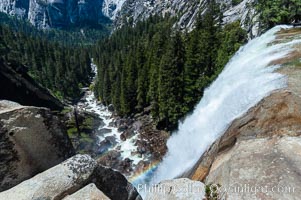 Vernal Falls cascades down through Little Yosemite Valley.  The Merced River is seen far below.  Yosemite National Park, Spring