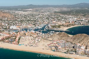 Image 28889, Cabo San Lucas, marina and downtown, showing extensive development and many resorts and sport fishing boats. Baja California, Mexico, Phillip Colla, all rights reserved worldwide.   Keywords: abaja:aerial:aerial photograph:baja california:beach:cabo marina:cabo san lucas:coast:development:downtown:harbor:hotel:marina:mexico:ocean:real estate:resort:sea:sea of cortez:ultralight.