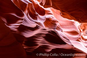 Canyon X, a spectacular slot canyon near Page, Arizona.  Slot canyons are formed when water and wind erode a cut through a (usually sandstone) mesa, producing a very narrow passage that may be as slim as a few feet and a hundred feet or more in height