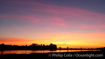 Sunset reflected in the still waters of Batiquitos Lagoon, Carlsbad, California