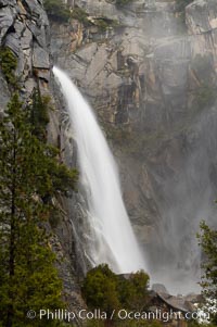 Lower Cascade Creek Falls drops 300 feet just off highway 140 near Yosemite Valley, Yosemite National Park, California